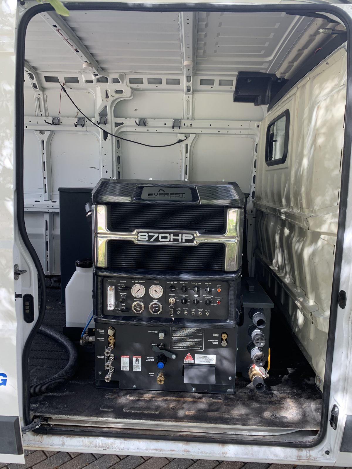 Truck-mounted extraction unit in the back of the Stain Lifters van, ready for water
removal